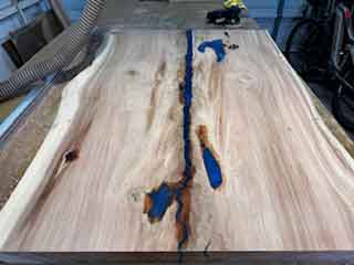 Custom Dark Blue Epoxy and Redwood Live Edge Bar Table with Custom Base
